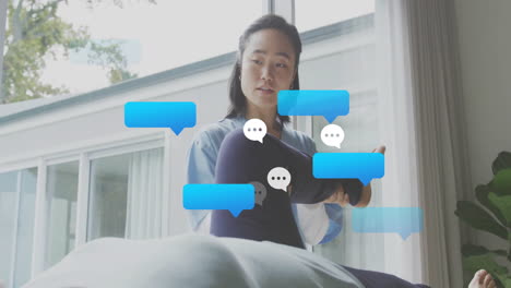 sitting woman with animation of digital chat bubbles, suggesting online communication