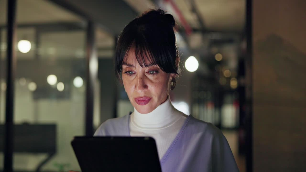 Businesswoman using tablet in office