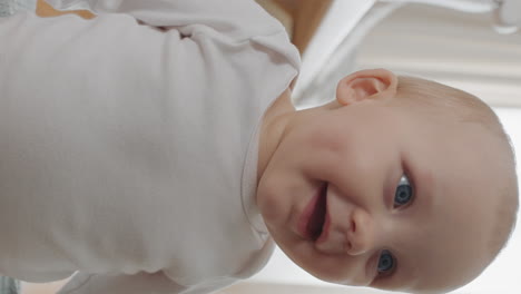 portrait beautiful baby with blue eyes looking curious toddler enjoying life healthy little infant on vertical orientation video chat