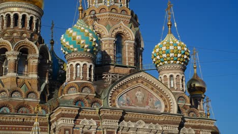 Close-up-shot-of-an-icon-on-a-Russian-Orthodox-church-located-in-Russia,-Saint-Petersburg,-Nevsky-prospect,-cinematic-colors,-blue-sky,-sunny-day,-still-shot