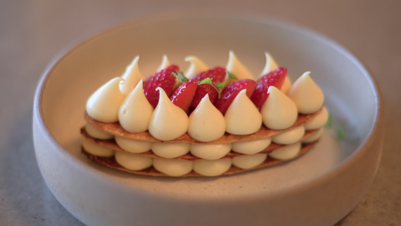 Mille feuille cake with strawberry on a plate