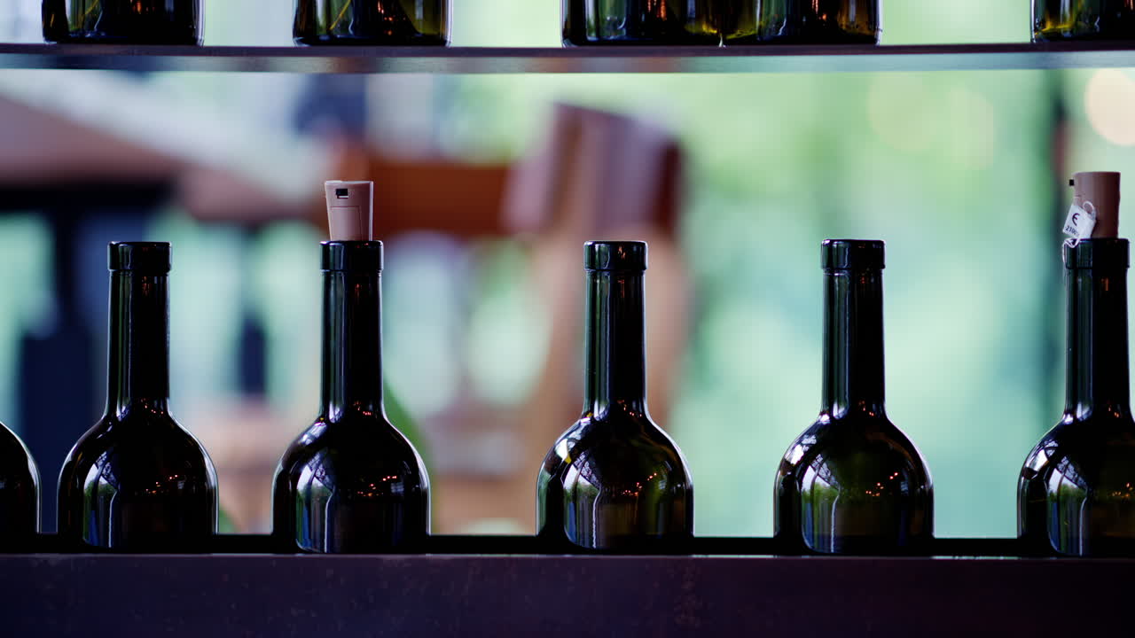 Wine bottles on shelves at a restaurant