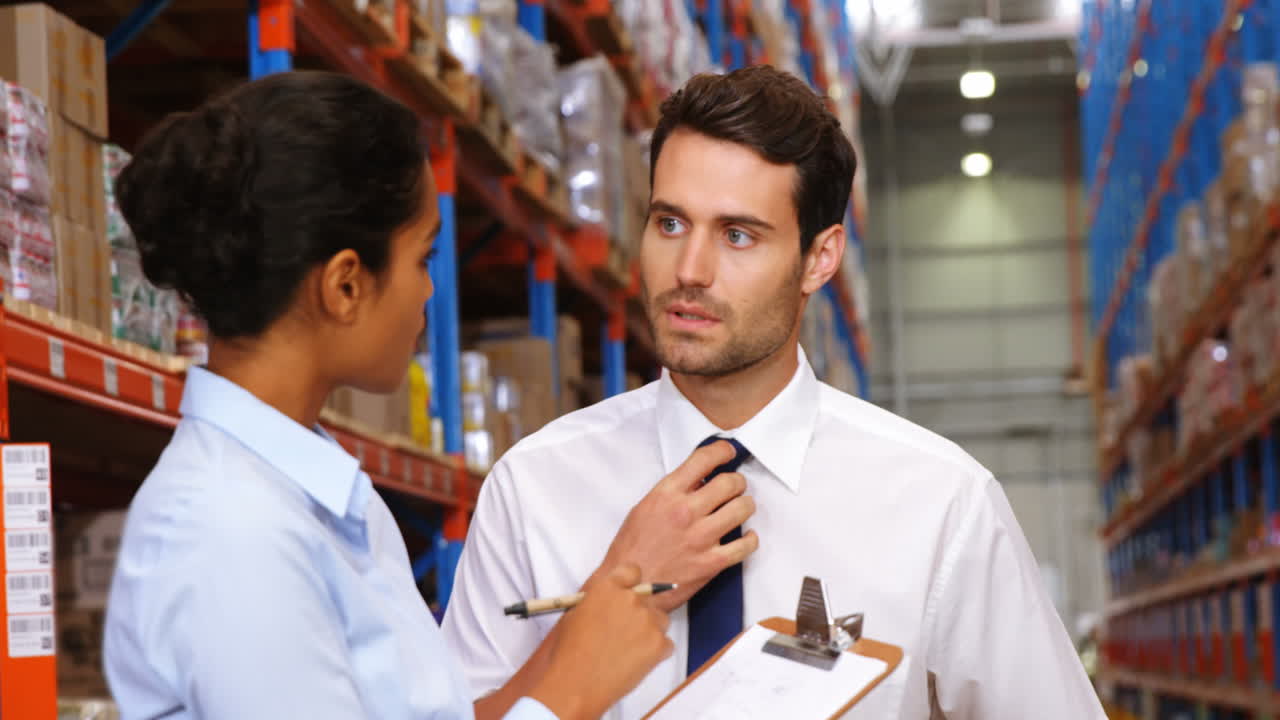 Warehouse workers working together 