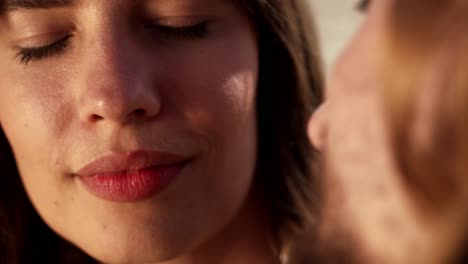 romantic couple embracing at sunset