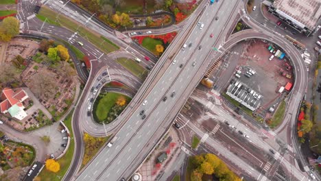 aerial bird's eye view of partial cloverfield interchange highway during the day