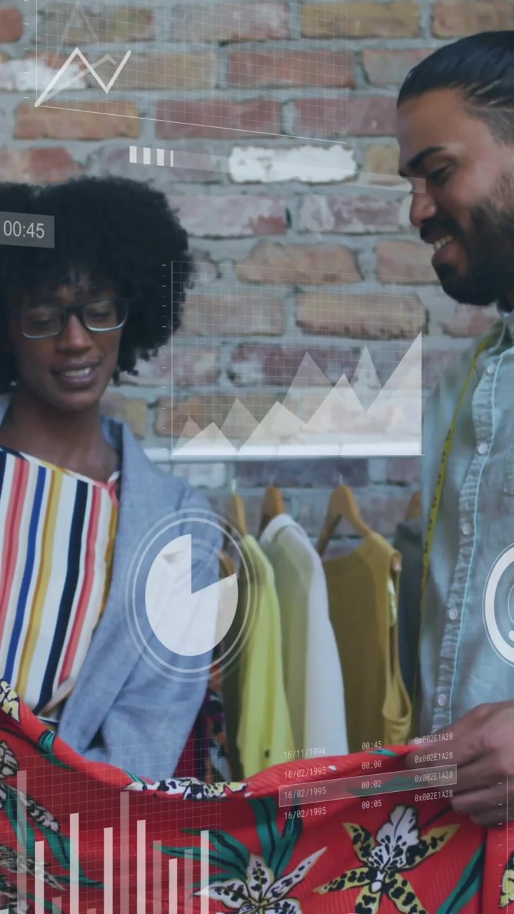 Fashion designers examining colorful fabric with data analytics animation overlay