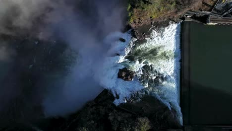 water from river flowing down on snoqualmie waterfall in summer