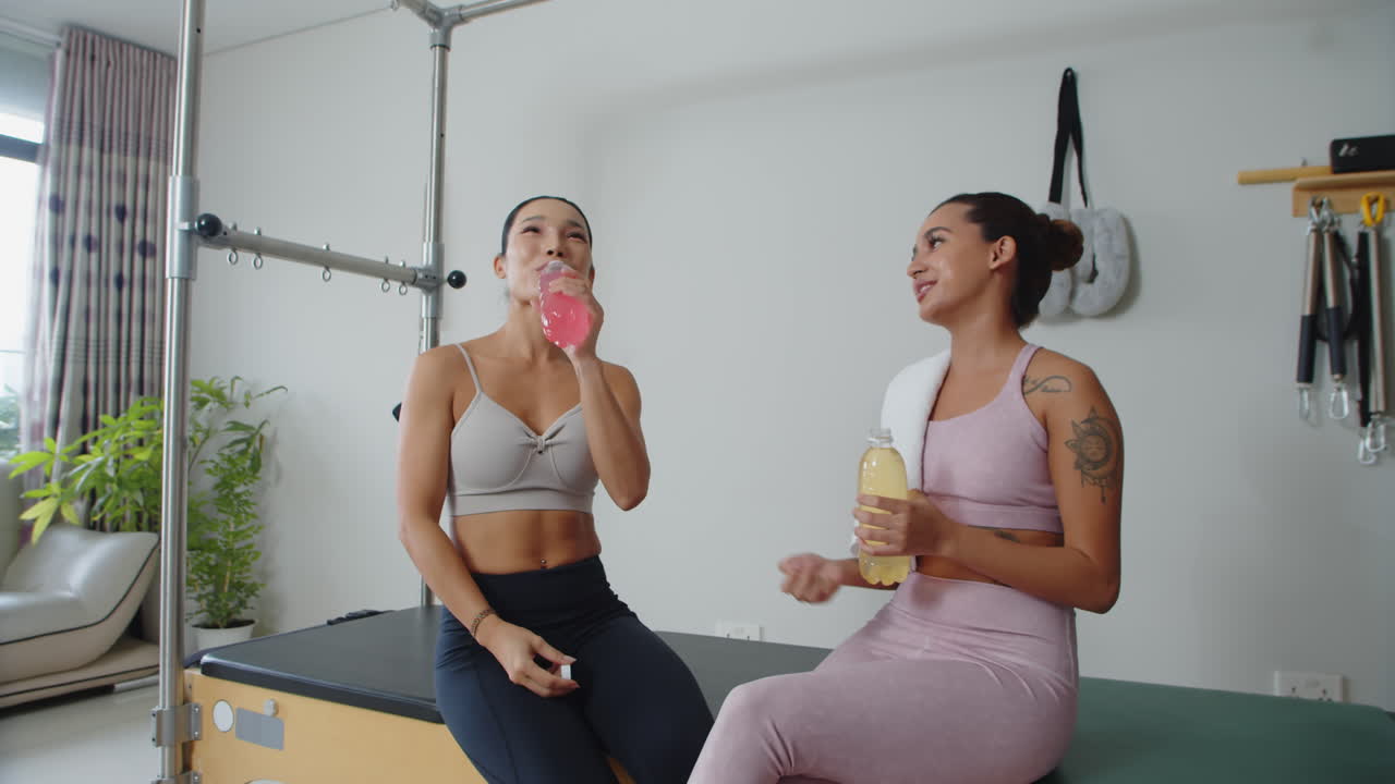 Sportswoman Sharing Feelings with Female Coach after Workout