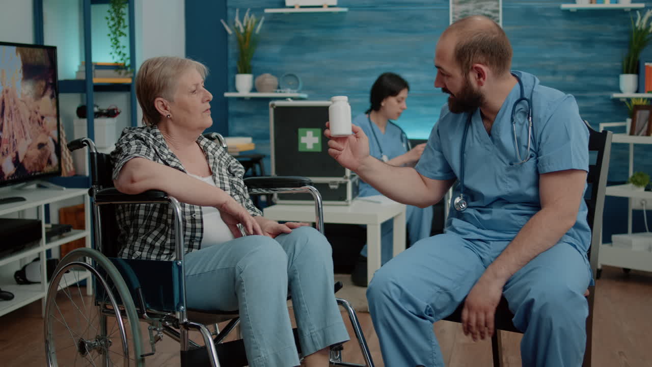 Senior woman with handicap receiving treatment from nurse