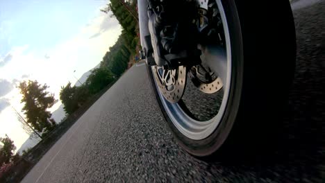 Motorcycle-Front-Tyre-View-Rolling-Fast-into-Turn