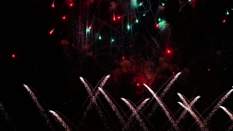 colorful fireworks exploding in the night sky. celebrations and events in bright colors.