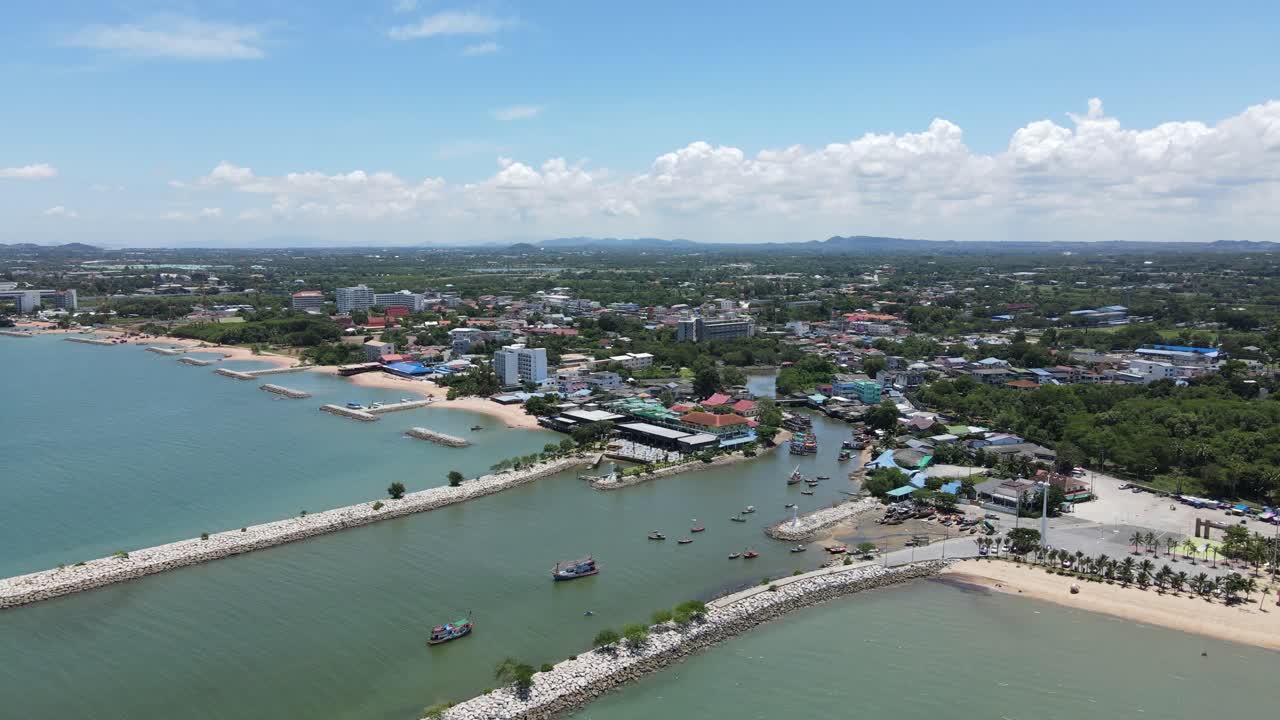 Sattahip Fishing Village with Vessels at Port. Aerial Drone Tilt Down Shot, Thailand.