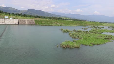 footage of water flow of dam reservoir of national irrigation authority built to produce hydroelectric energy in san roque dam, in pangasinan, philippines