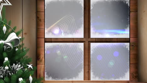 christmas tree and wooden window frame against digital wave and spots of light on blue background