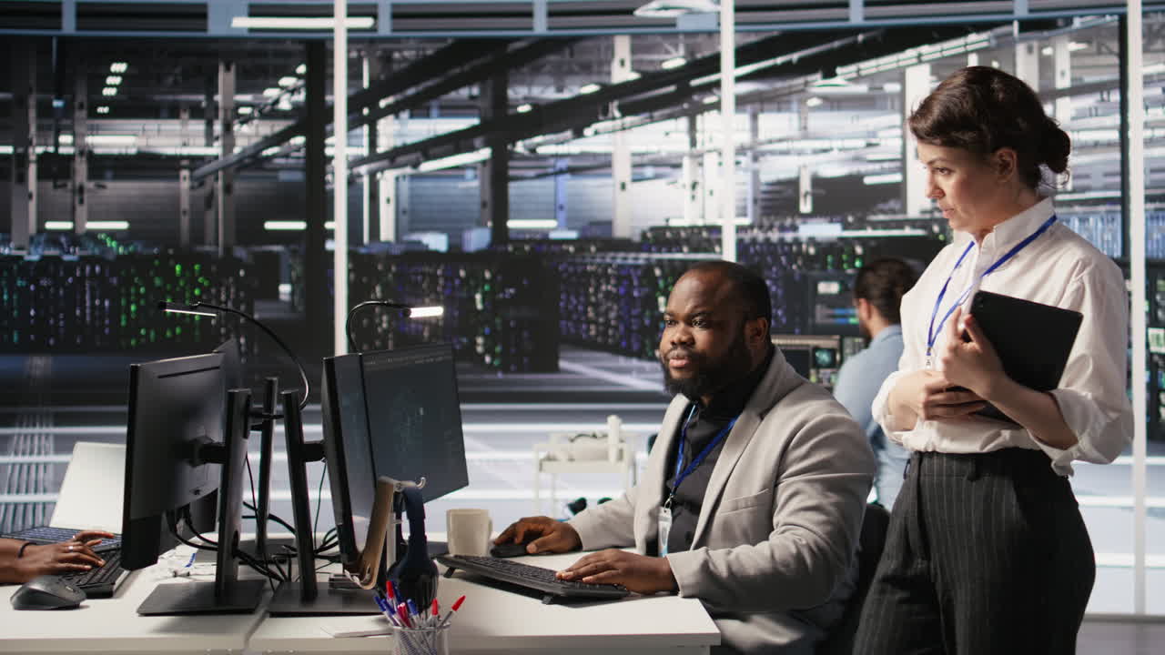 Vertical video Lead data center technician overseeing team integrating AI automation in rigs