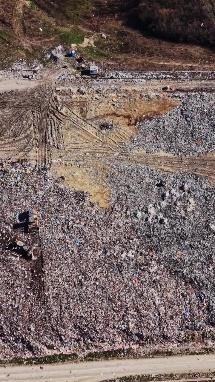 Top down view of landfill cells and dirt road