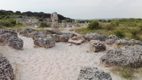 very low drone footage over ancient ruins, bulgaria