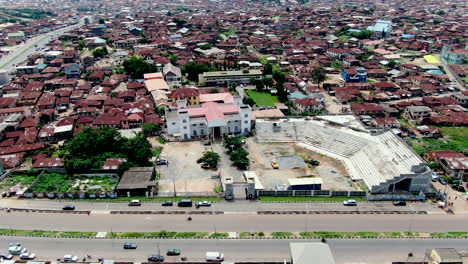 the aafin alake palace and surrounding suburb in abeokuta town, ogun state of nigeria - aerial push in view