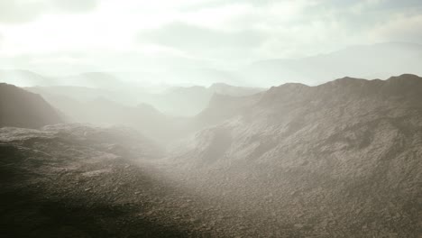 aerial vulcanic desert landscape with rays of light
