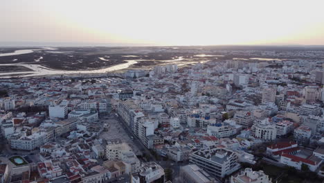 Drone-View-Orbiting-Faro-City-in-Algarve,-Portugal