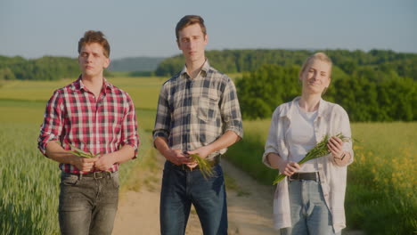 portrait of three satisfied confident farmers