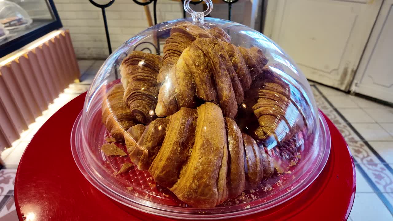 Delicious Croissants Under a Clear Dome