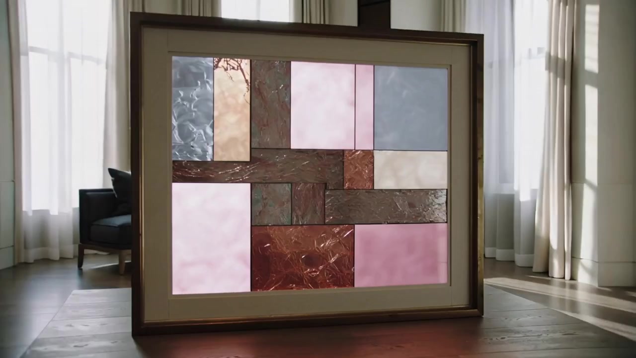 Moving camera circling framed stained-glass panel at home, showing shifting sunlight patterns