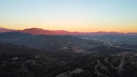 Beautiful-aerial-view-of-Osona-mountains-in-Catalonia-at-sunset,-Spain