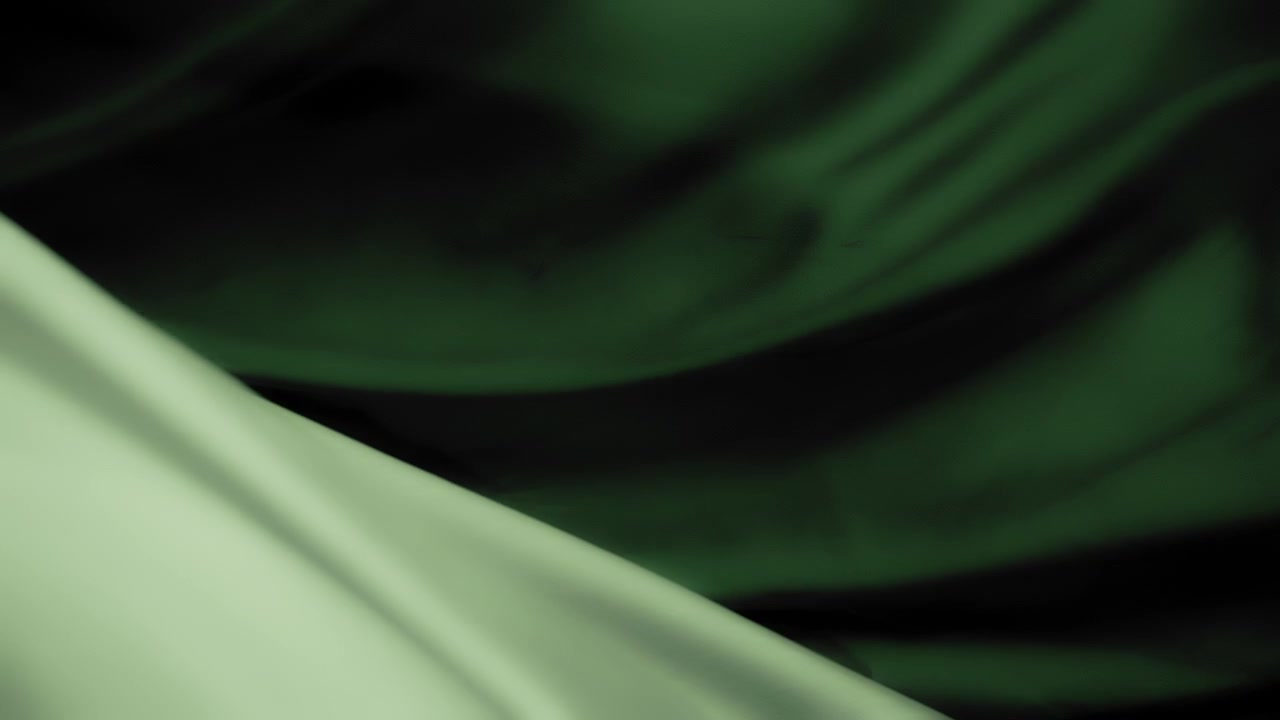 Silky green fabrics waving in the wind