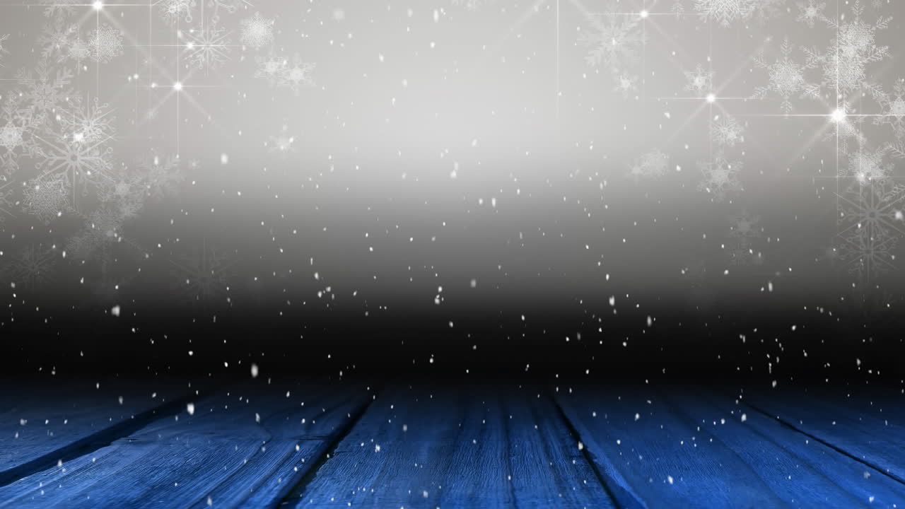 복사 공간과 나무 보드와 함께 빛의 반점 위에 떨어지는 눈의 애니메이션