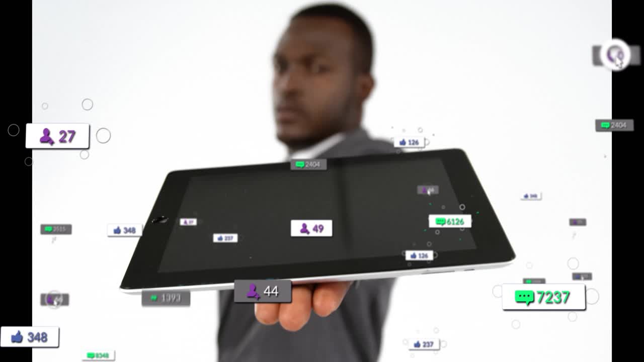 Man presenting blank tablet initiating swirling social media icons demonstrating engagement growth
