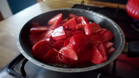 cooking tomato sauce in a kitchen