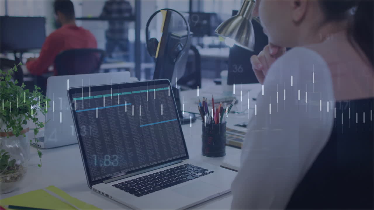 Financial data processing animation over woman working at desk in office