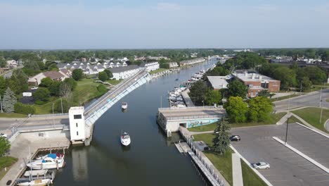 boats passing underneath erie street bridge, port huron, michigan, usa