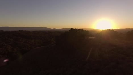 Lens-flare-as-camera-approaches-sunset