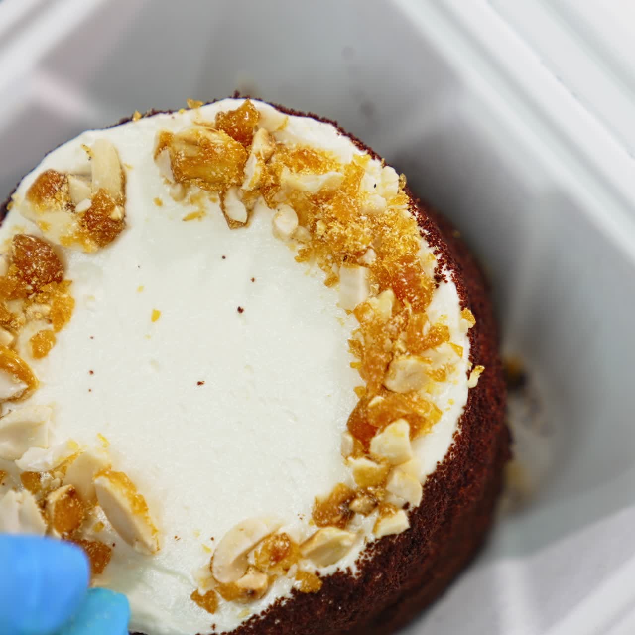 Pastry sweet cake decorating. Bakery specialist prepairing tasty confectionery