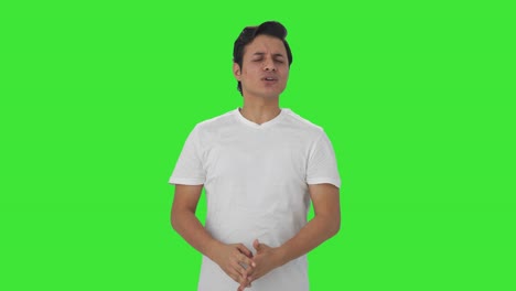 angry indian man shouting on someone green screen