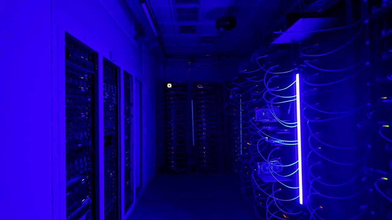 Multiple servers with flashing red lights in a data center