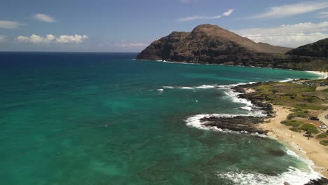 A-flyover-of-the-Makapuu-beach-park-heading-towards-the-lighthouse