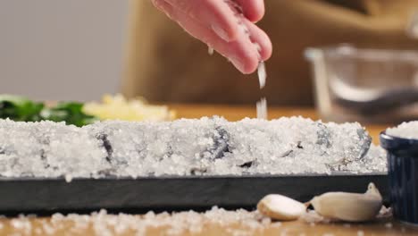 preparing salt-crusted fish