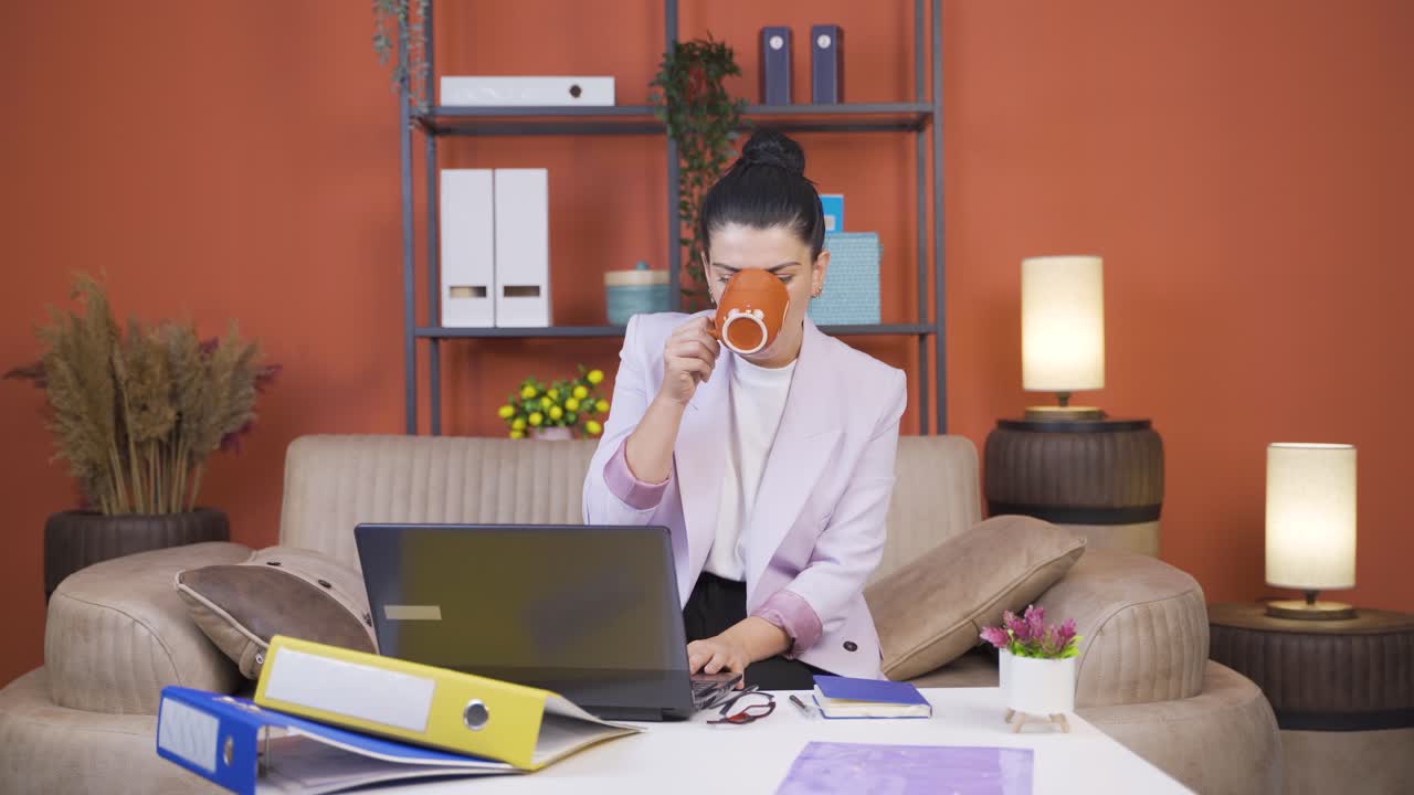 Home office worker young woman has tooth sensitivity.