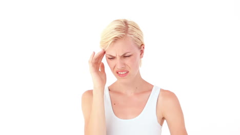 blonde woman having headache