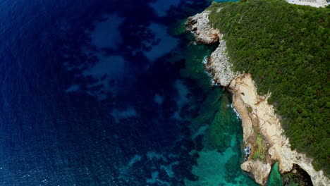 Aerial-drone-view-of-the-rocky-coastline-in-Preveza,-in-the-Epirus-region-in-Greece