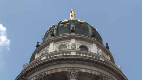 medium shot of dome of french cathedral of friedrichstadt at gendarmenmarkt, französischer dom, berlin, germany