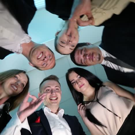 business team is showing ok sign