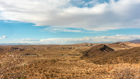 an amazing view of the diverse terrain that makes up the mojave desert landscape - cloudscape time lapse