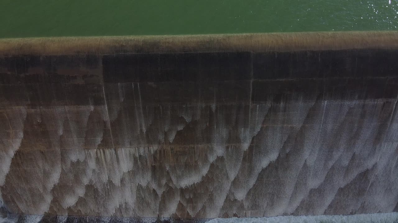 View of the Asprokremmos Dam wall as it overflows in the first overload in many years