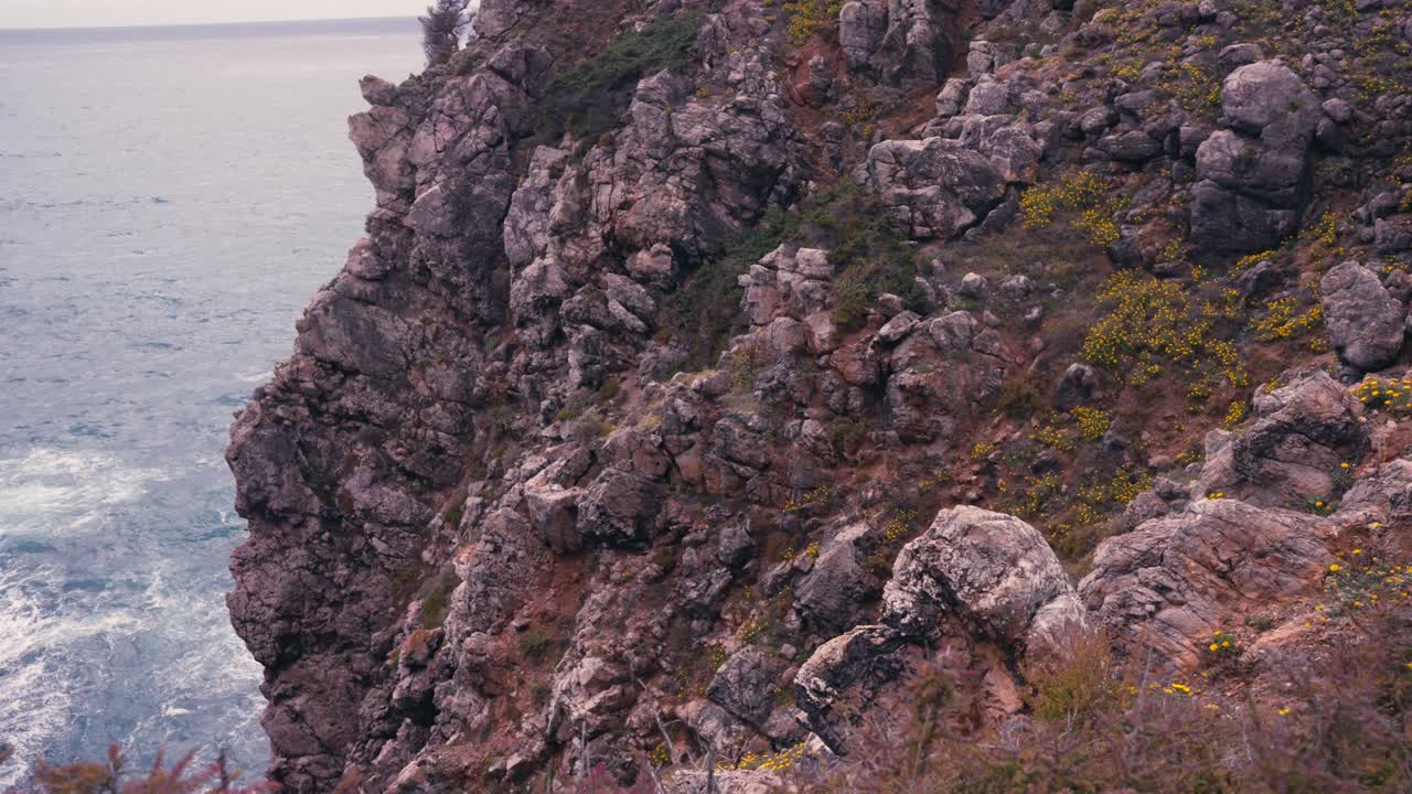 Rocky Cliffs At Ponta da Piedade Headland On The Algarve Coast Near Lagos In Portugal. Close-up Shot