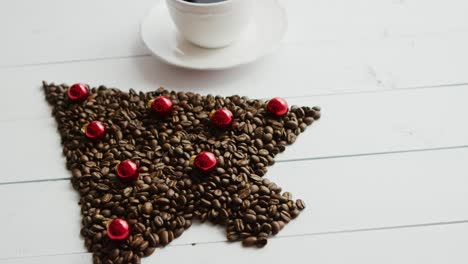 coffee beans in shape of conifer and cup