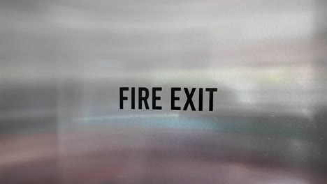 fire exit sign on metal door